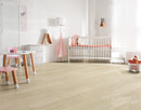 Limestone Oak 8.5mm hybrid flooring installed in a kitchen and dining room